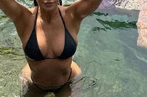 Kim Kardashian Pours Curves Into World S Tiniest String Bikini For