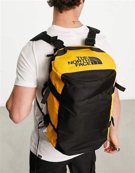 The North Face Base Camp Extra Small 31l Duffel Bag In Yellow And Black