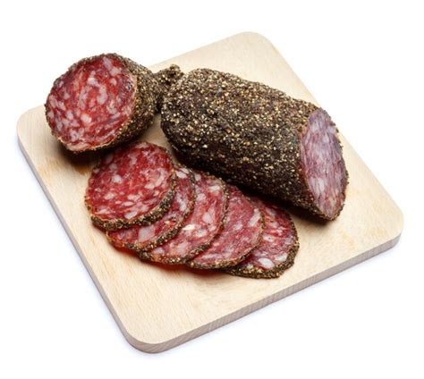 Premium Photo Dried Organic Salami Sausage Covered With Pepper On