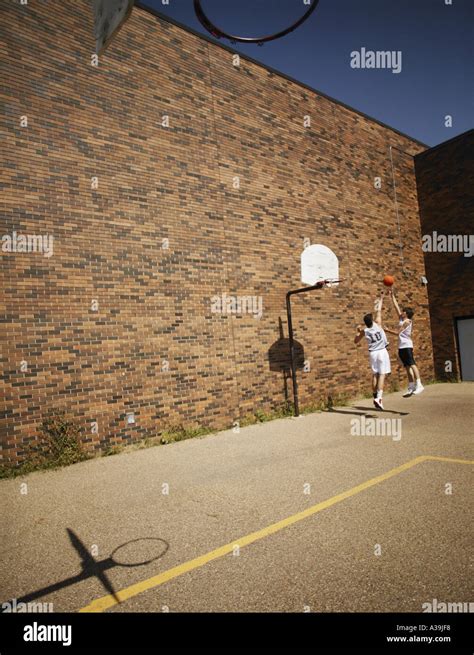 Two basketball players Stock Photo - Alamy