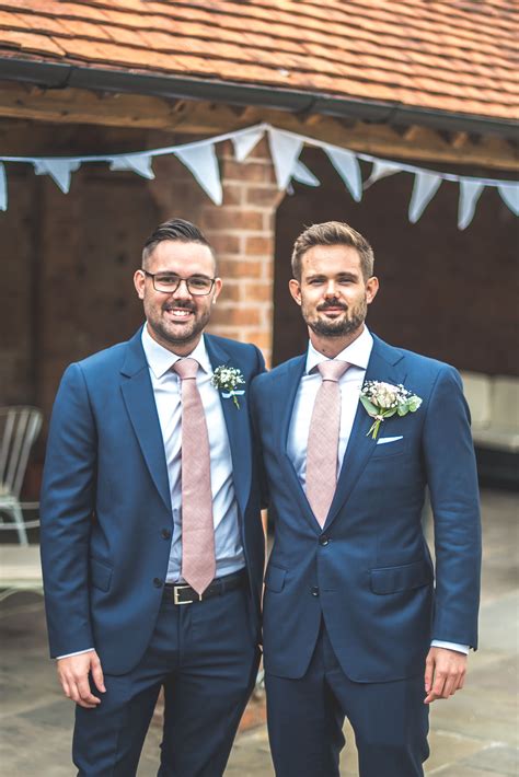 Groom And Best Man In Navy Suits With Pale Pink Ties Blue Suit