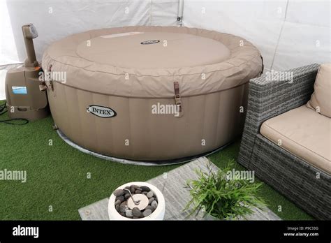 Inflatable Hot Tub In Garden Gazebo Stock Photo Alamy