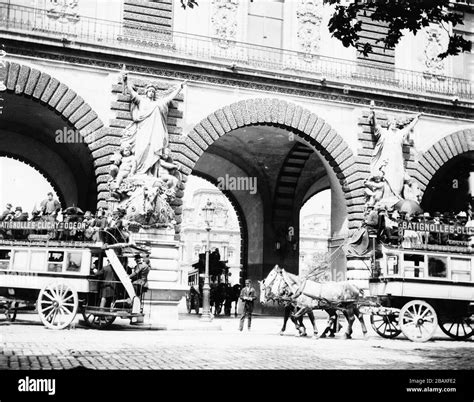 Horse Drawn Omnibuses At The Entrance To The Louvre Museum Paris