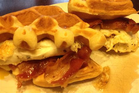 Fried Egg And Bacon Waffle Sandwich With Maple Syrup Drizzle A Caterers Day Off Breakfast