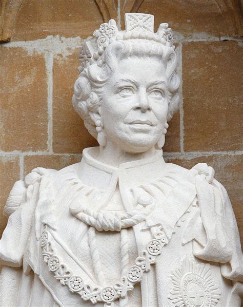 A statue of Queen Elizabeth II by the Great West Door of Canterbury... | Elizabeth ii, Queen ...