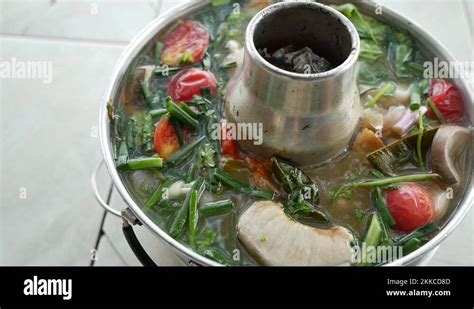 Close Up Footage Of Hot And Spicy Red Tail Cat Fish Tum Yum Soup Stock Video Footage Alamy