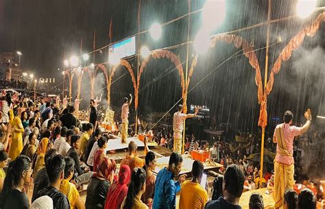 Heavily Rains In Varanasi Ganga Aarti Amidst Rain Water Level Of River