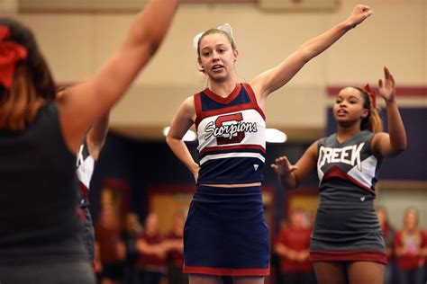 Twelfth Grader Ashlynn Lahoe 19 Gets Cheer Guidance During A