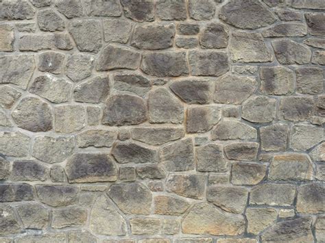 grey stone wall background 33118560 Stock Photo at Vecteezy