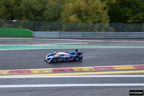 The Peugeot Lmp Racing Through Raidillon The Peug Flickr