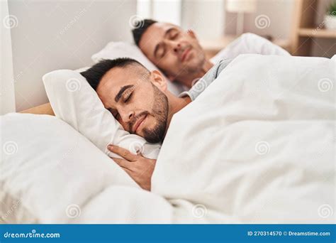 Two Men Couple Lying On Bed Sleeping At Bedroom Stock Photo Image Of