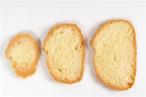 Premium Photo A Loaf Of Bread Cut Into Slices