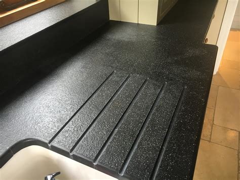 Kitchen black granite surfaces clean and treatment | Bespoke Repairs