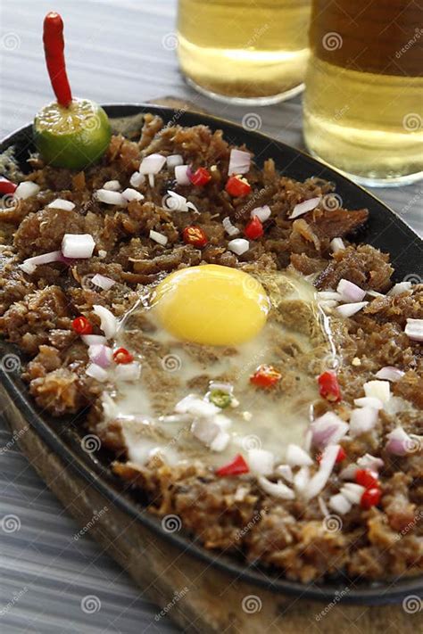 Sizzling Pork Sisig Filipino Dish Of Chopped Pig Ears And Snout With