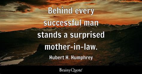 Hubert H. Humphrey - Behind every successful man stands a...