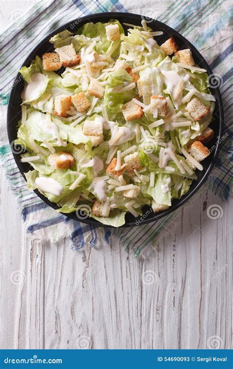 Traditional Caesar Salad On A Plate Vertical Top View Stock Image