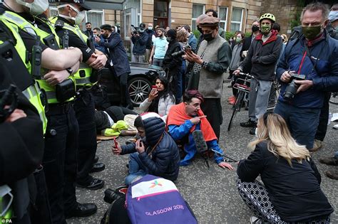 Hundreds Of Protesters Lie Under Home Office Van To Block Immigration