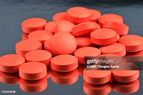 Round Orange Pill Photos And Premium High Res Pictures Getty Images