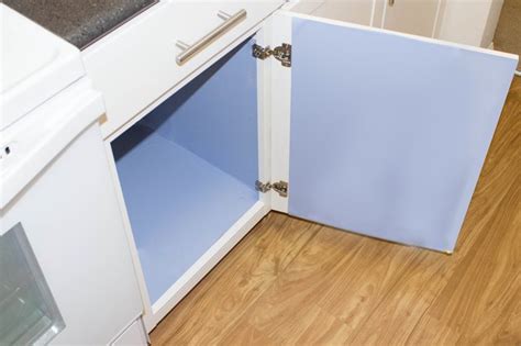 How To Cover Kitchen Cabinets With Vinyl Paper Hunker