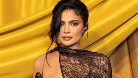 Kylie Jenner Turns Up The Heat In Claudia Schiffer S Red Chanel Bikini