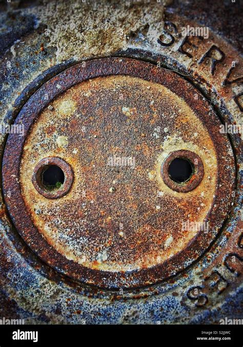 Faces in objects concept. Rusty sewer in Sabadell, Barcelona province ...