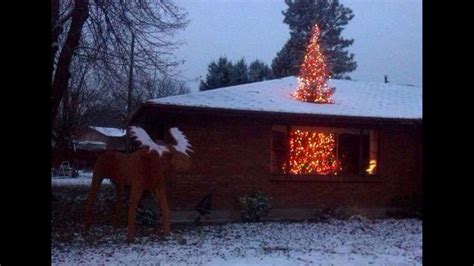 Christmas tree 'busted' through roof goes viral | 11alive.com