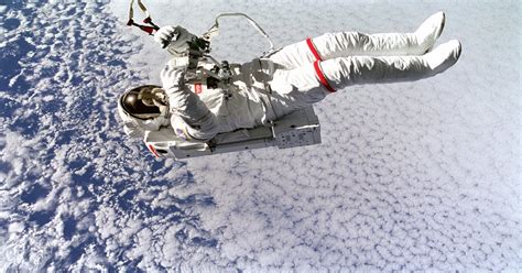 Backdropped Against Clouds 130 Nautical Miles Below Astronaut Mark C