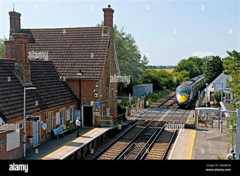 British Rail Class 395 Javelin Train Approaching The Manually Operated Level Crossing At Wye