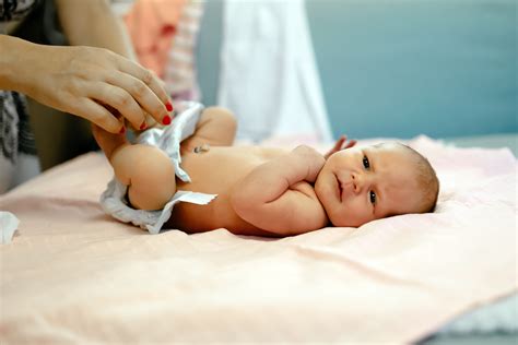 Parent Changing Newborn S Diapers The Jax Baby Company