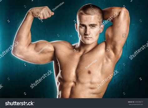 Strong Handsome Men Showing His Biceps Stock Photo 339978677 Shutterstock