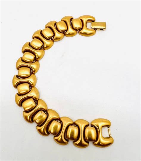 Monet Matte Gold Tone Plated Articulated Bracelet Sig Gem