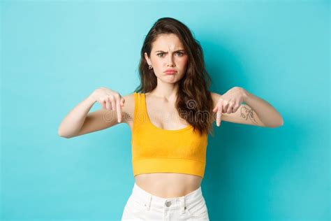 Confused Frowning Woman Looking Displeased Need Explanation Pointing Fingers Down At Something