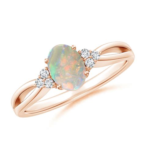 Solitaire Oval Opal Split Shank Ring With Trio Diamonds Angara