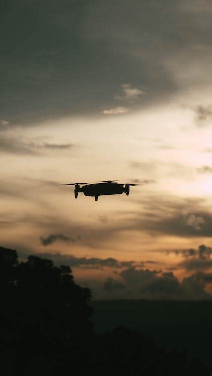 Silhouette of a Drone During Sunset · Free Stock Photo