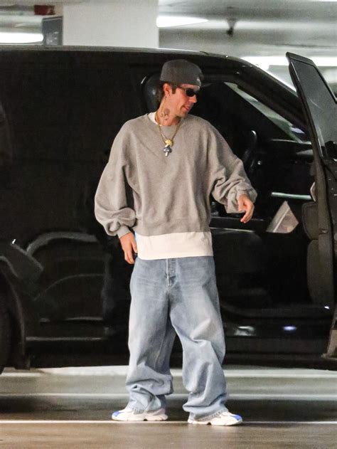 The Biebers Cap Off a Year of Sublime Fits with Another Stylish Outing | GQ