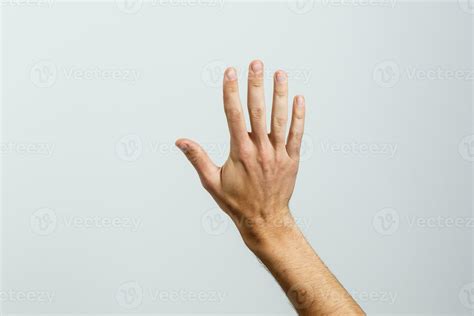 Open Palm Hand Gesture Of Male Hand Isolated On White Background