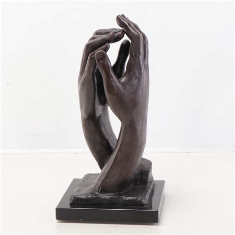 Metal Sculpture of Hands Embracing | EBTH