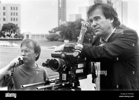 JFK, director Oliver Stone (right), on location, 1991. ©Warner Brothers ...