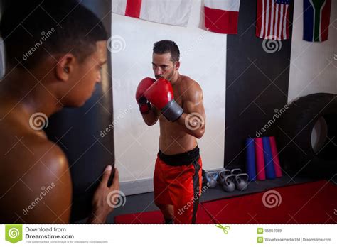 Trainer Assisting Man In Boxing Stock Image Image Of Fist Challenge