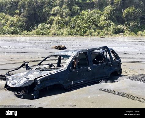 Wrecked Car On Beach Stock Photo Alamy