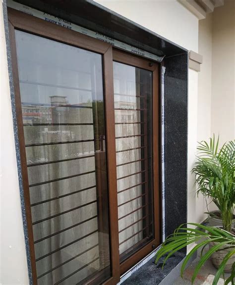 2 Track Brown Upvc Glass Sliding Window At Rs 750sq Ft Upvc Window In Bhopal Id 2852883980273