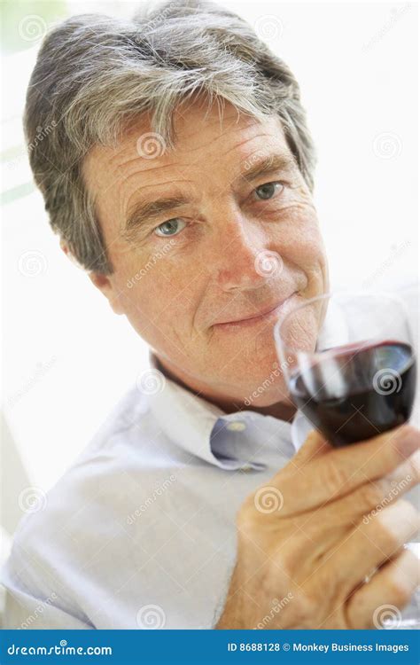 Man Drinking A Glass Of Red Wine Stock Photo Image Of Cheerful