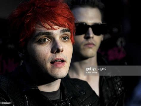 Singer Gerard Way And Musician Mikey Way Pose At A Press Party Of