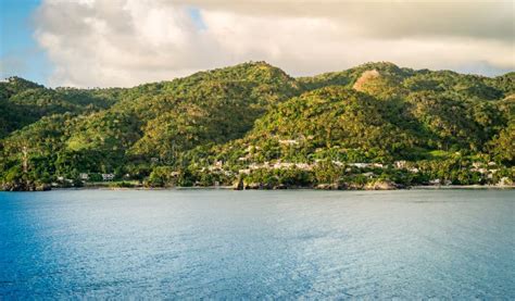 Samana Bay Landscape With Two Sharp Coastal Rocks Under Cloudy Sky