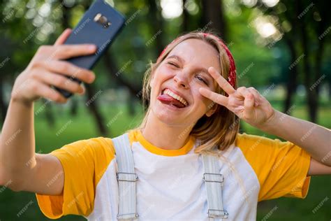 Free Photo Cheerful Woman Taking Selfie Outdoors