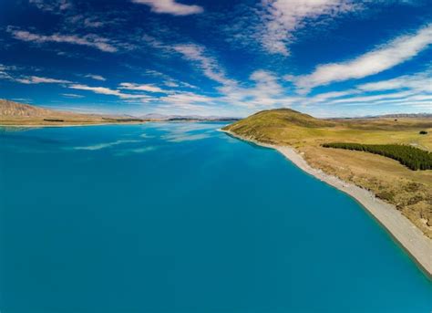 Premium Photo | Aerial drone shots of beautiful lake tekapo with ...