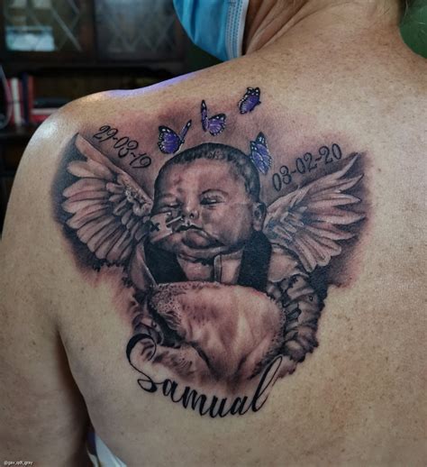 Baby Angel Tattoos On Chest