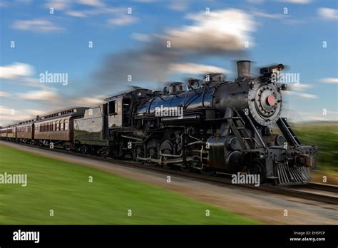 Historic Steam Train Passes Through The Fields Stock Photo Alamy