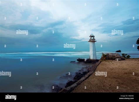 Lighthouse on the carita beach, banten, indonesia Stock Photo - Alamy