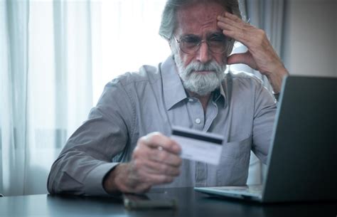 Premium Photo An Elderly Man Experiencing Financial Difficulties Due